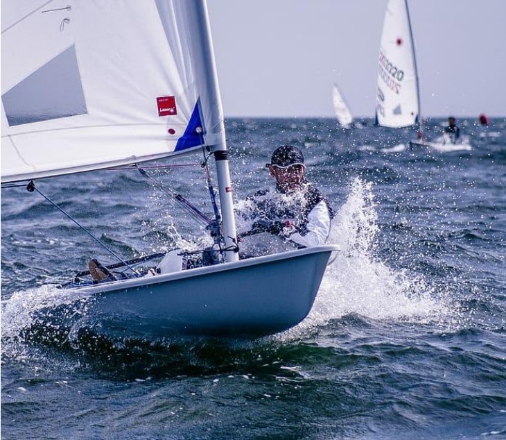 Sailor on a Laser dinghy